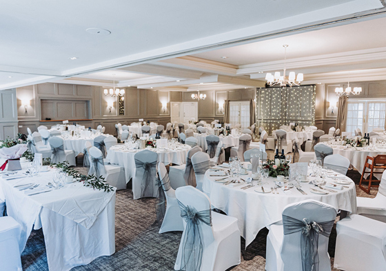 Wedding meal set up with white and silver accents